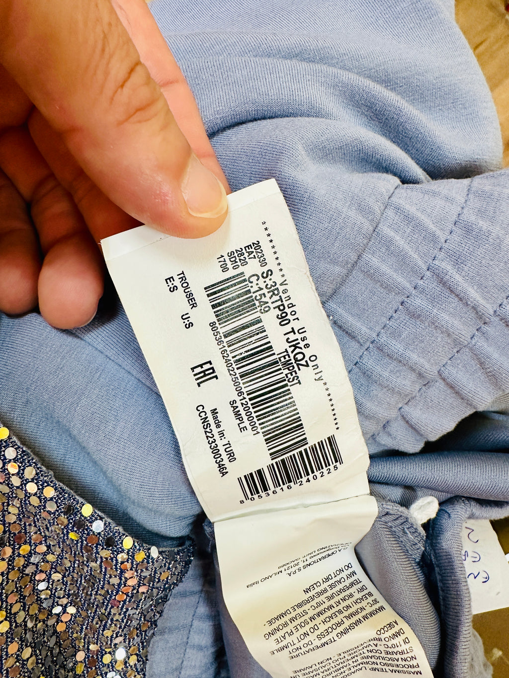 Ensemble jogging femme EA7 Emporio Armani gris bleu à sequin.